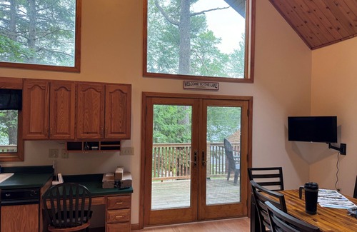 Hancock County Ski Chalet | Beautiful beachfront chalet with southern exposure on Green Lake,Dedham, Maine.