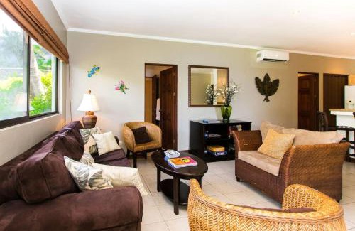 Playa Flamingo House | Beautiful Condo in Peaceful Cliffside Location with a Private Balcony & Stunning Ocean and Mountain Views