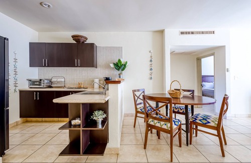 Libertad Apartment | Beautiful condo with a balcony, kitchen, sparkling pools, & fitness center