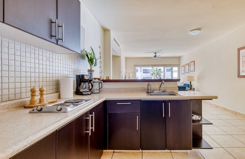 Libertad Apartment | Beautiful condo with a balcony, kitchen, sparkling pools, & fitness center