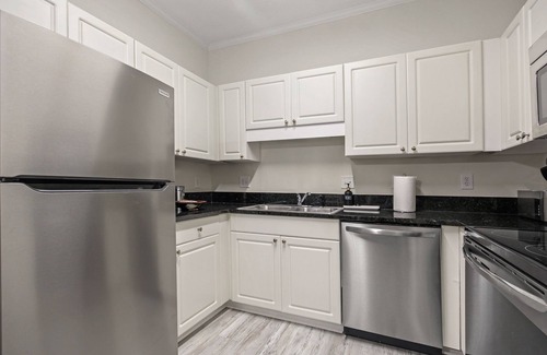 Vaught Condo | Beautiful condo with pool. 5 minute drive to beach. Sleeps 8. Pet friendly