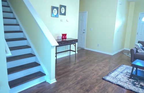 Charlotte House | Beautiful end unit vacation home for short term rental with adequate sunlight.