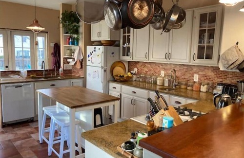 West Medford Apartment | Beautiful, family-friendly home with yard and patio near Tufts, 10 min to Boston