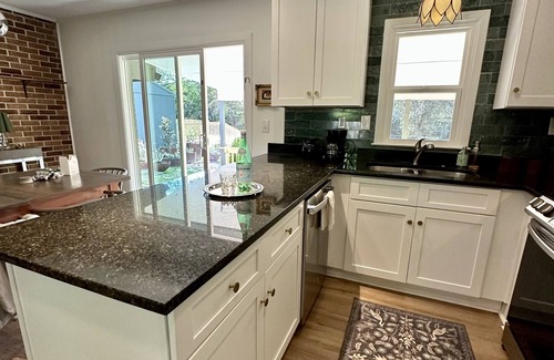 Perry House | Beautiful Green House with a huge Backyard! Just 1 mile from Downtown Perry