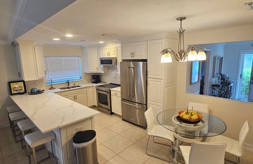 Naples Park House | Beautiful Home & Amazing Pool Oasis, Close to Beach, FREE Bikes, Full Amenities