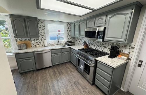 Riverside House | Beautiful home on historic street within walking distance of Riverside Plaza!