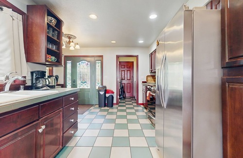 Indianola House | Beautiful home with foosball table, waterfront views, fireplace, basketball cour