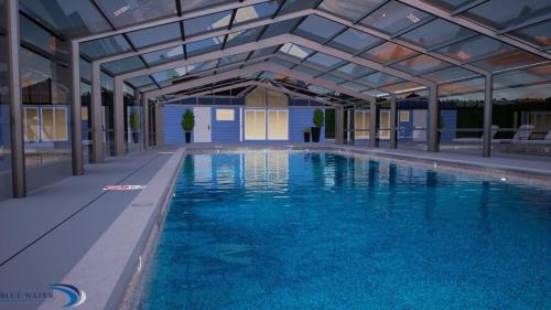 South Haven House | Beautiful home with year round swimming and hot tub!