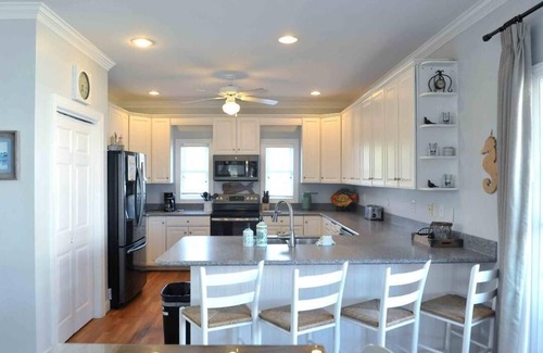 Shallotte House | Beautiful ICW views! Private pier, pool, hot tub, fire pits, and more!