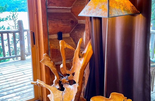 Coeur d'Alene House | Beautiful Log Cabin w/Beachfront & Stunning Lake Views in Coeur d'Alene Idaho.