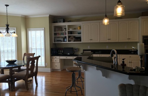 Evans House | Beautiful Masters Rental with pool & tropical landscaping