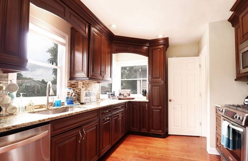 Fox Lake House | Beautiful Nautical 4/3 Waterfront with Bonus Apartment, Hot Tub, and Large Deck