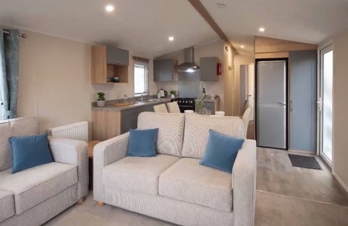Cresswell House | Beautiful new caravan with decking - 500 yards to beach