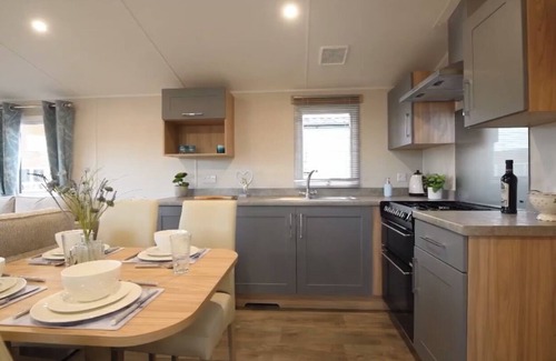 Cresswell House | Beautiful new caravan with decking - 500 yards to beach