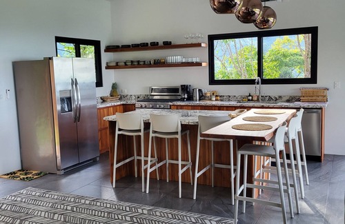 Ballena House | Beautiful new home with wrap around views of the ocean and two waterfalls