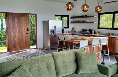 Ballena House | Beautiful new home with wrap around views of the ocean and two waterfalls