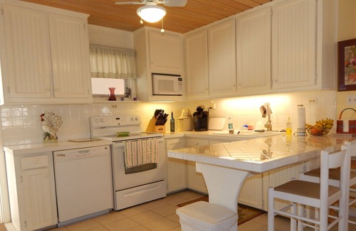 Little Torch Key Cottage | Beautiful Old Fashion First Floor Tropical Garden Canal Front Cottage on MM 26
