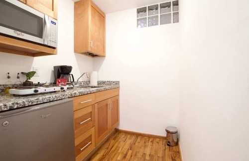 La Condesa Apartment | Beautiful Peach Flower Art Wall Condesa G7