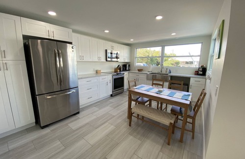 Key Largo Village House | Beautiful Remodeled Home on the Water! 40 ft dock & short walk to private beach!