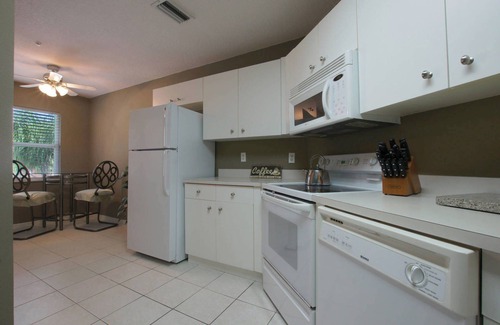 Naples Condo | BEAUTIFUL RESORT STYLE CONDO WITH AMAZING LAKE VIEWS!