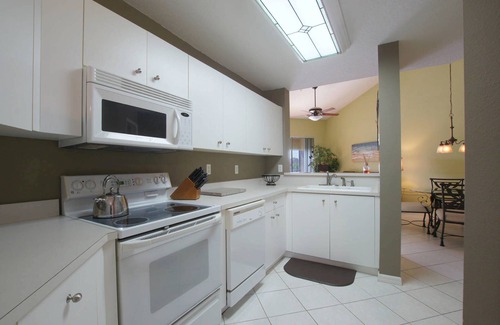 Naples Condo | BEAUTIFUL RESORT STYLE CONDO WITH AMAZING LAKE VIEWS!
