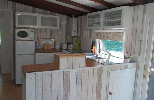 Builth Wells Ski Chalet | Beautiful river front self catering holiday lodge.