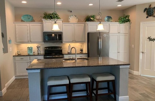 Rotonda Lakes House | Beautiful spacious 3 bedroom/ 2 bath pool home with an outdoor kitchen