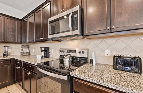 Four Corners Cottage | Beautiful Townhome With Splash Pool and Game Room!