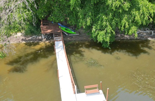 Edgerton House | Beautiful Waterfront Wooded 6 Bedroom Home ~ On the Rock River/ Lake Koshkonong