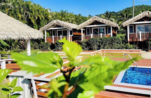 Rarotonga Cottage | Beautifully appointed inland property with ocean and mountain views.