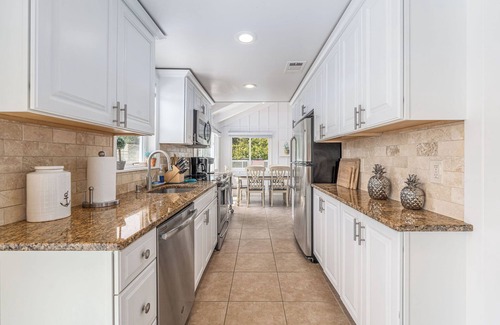 Southold House | Beautifully appointed waterfront property with heated pool and cabana