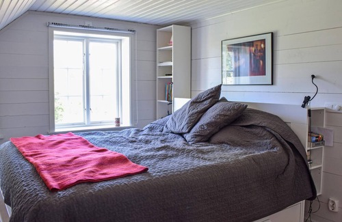 Holmsjo House | Beautifully located house with large porch on the back.