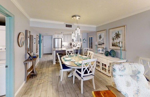 Thomas Drive Condo | Beautifully renovated Master on Gulf Free round of Golf & Activities Daily!