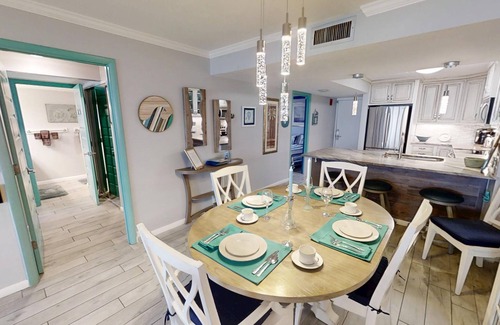 Thomas Drive Condo | Beautifully renovated Master on Gulf Free round of Golf & Activities Daily!