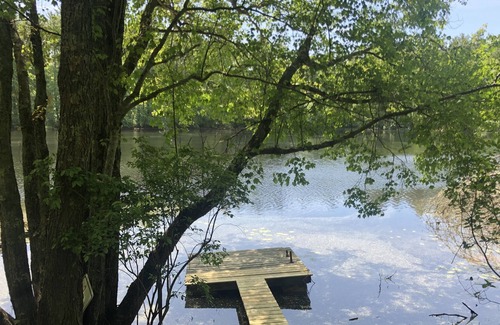 Carver Cabin | Beautifully wooded cabin on a pond- close to the city, even closer to the beach!
