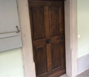 Zug House | Bedroom cum office with shared shower in Zug's Old Town