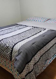 Mississauga House | Bedroom with double bed