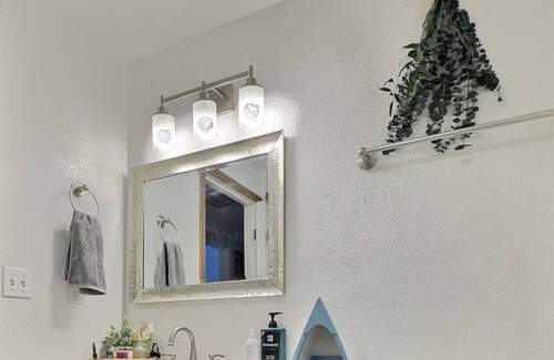 Springfield House | Bedroom with garden view and shared bathroom