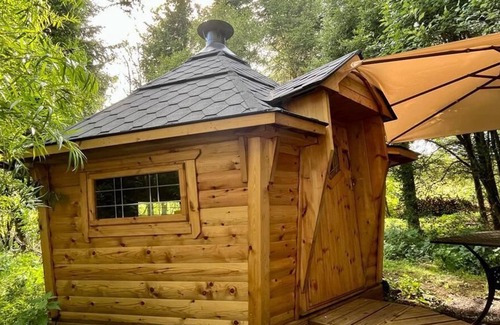 Wing RV Rental | Bell tent with river view