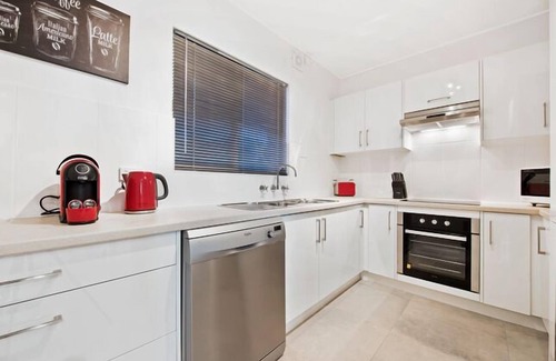 West Beach Apartment | Belle Vista apartment absolute beach front w/Free WiFi