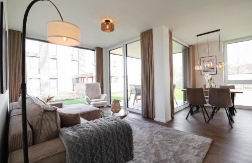 Marienleuchte Apartment | BeltBlick 14- Küstenleuchten - Moderne Ferienwohnung direkt am Strand mit Sauna und Garten!