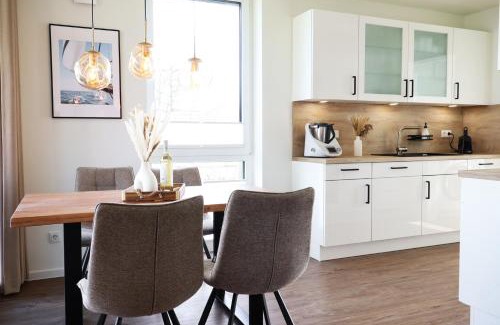 Marienleuchte Apartment | BeltBlick 14- Küstenleuchten - Moderne Ferienwohnung direkt am Strand mit Sauna und Garten!