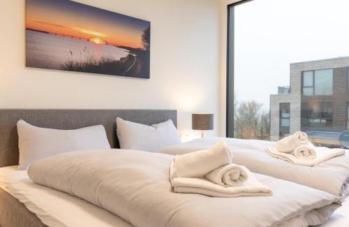 Marienleuchte Apartment | BeltBlick 22 - Stilvolle Ferienwohnung mit Sauna direkt an der Ostsee!