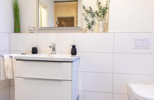 Marienleuchte Apartment | BeltBlick 22 - Stilvolle Ferienwohnung mit Sauna direkt an der Ostsee!