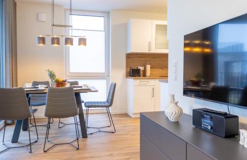 Marienleuchte Apartment | BeltBlick 22 - Stilvolle Ferienwohnung mit Sauna direkt an der Ostsee!