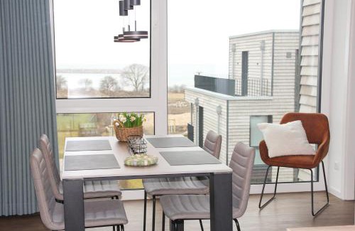 Marienleuchte Apartment | BeltBlick 29 - Moderne und barrierefreie Ferienwohnung mit Dachterrasse und Meerblick