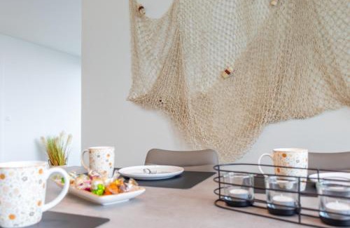 Marienleuchte Apartment | BeltBlick 29 - Moderne und barrierefreie Ferienwohnung mit Dachterrasse und Meerblick