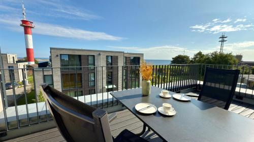 Marienleuchte Apartment | BeltBlick 30 – Moderne Ferienwohnung mit Dachterrasse direkt an der Ostsee!