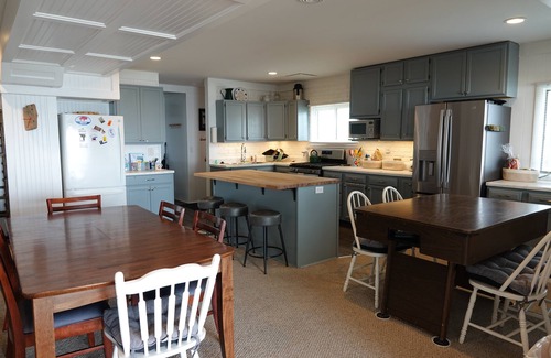 Bemus Point House | Bemus Point lakefront family home with deck, dock, boat slip, sunroom with view