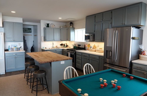 Bemus Point House | Bemus Point lakefront family home with deck, dock, boat slip, sunroom with view